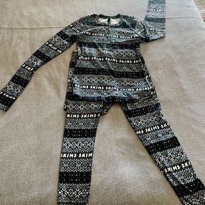 SKIMS lounge wear pants and top.